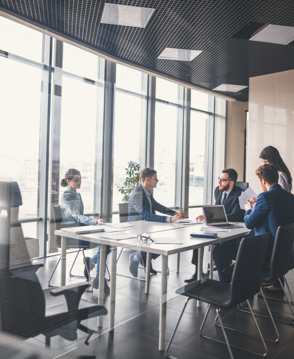 business-executives-with-headsets-using-computer 1